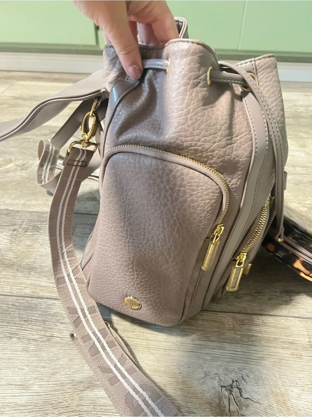 DKNY Mauve-Taupe Leather Drawstring Backpack with Gold Hardware
